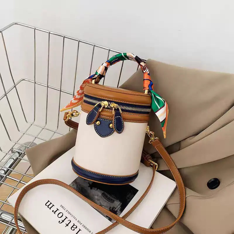 Colorblocked cylindrical bag 2025 new niche design retro handbag messenger bag FairWonder